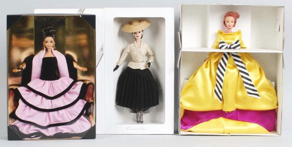 Lot of 3: Barbie Dolls.: Includes one Bill Blass Limited Edition Barbie, one Escada Barbie, and one Christian Dior Barbie. All in original boxes and have never been played with. Condition (Near Mint Plus).