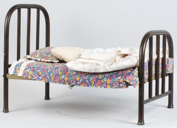 Lot of 6: Beds & Highchairs.: Includes one brass doll bed, one iron doll bed and four wooden doll high chairs. Condition (Excellent). Size Largest: 21 - 3/4" x 29".