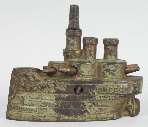 Cast Iron Oregon Still Bank.: All original including turn pin. Condition (Excellent). Size 6" L.