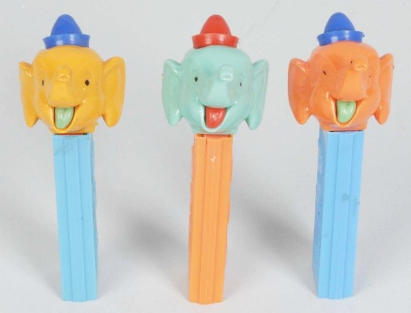 Lot of 3: Circus Elephant Pez Dispensers.: All three different color variations. Condition (Excellent). Size Each: 4 - 1/4" T.