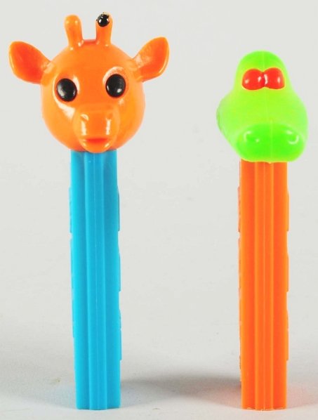 Lot of 2: Animal Pez Dispensers.: Includes one giraffe and one lime green crocodile. Condition (Excellent). Size Largest: 4 - 1/4" T.