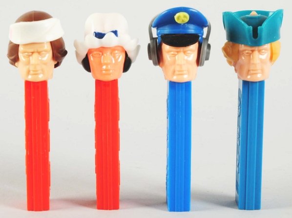 Lot of 4: Pez Dispensers.: Includes a wounded soldier, Betsy Ross, pilot, and the Patriot. Condition (Excellent). Size Largest: 4 - 1/2" T.