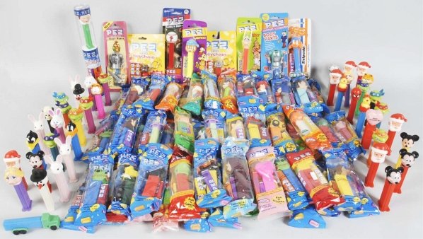 Large Lot of Pez Dispensers.: Many are in original packaging. Condition (Excellent).