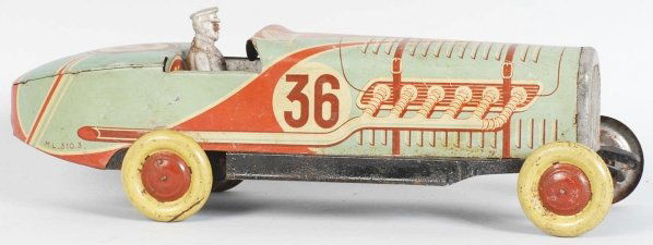 Tin Litho Race Car Wind-Up Toy.: French. Working. Marked "36" on sides and "Paris Made in France". Driver and underside of car have pitting and rust. Condition (Good - Very Good). Size 14 - 1/2" L.