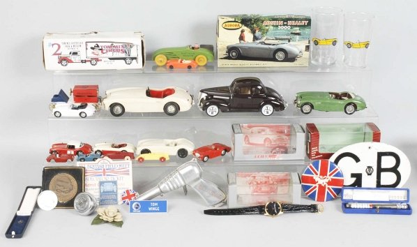 Lot of Plastic & Metal Vehicle Toys.: Includes shot glasses, one toy gun, and other items. Not all pictured. Condition (Very Good). Size Largest: 8" L.