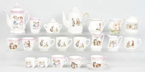 Lot of 2: Child's Tea Sets.: Depicting children. Including over 24 pieces. Condition (Very Good - Excellent). Size Largest: 5" T.