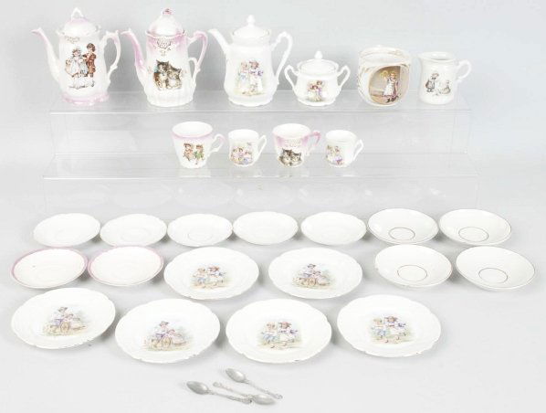 Lot of 2: Child's Tea Sets.: Children playing. Includes over 25 pieces. Condition (Very Good - Excellent). Size Largest: 4 - 7/8" T.