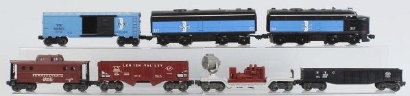 Lionel Boston & Maine Freight Train Set.: Post-war. Includes no. 217 AB unit, one boxcar, one searchlight car, one NYC gondola, one Lehigh Valley, and one Pennsylvania caboose. This is not a cataloged set. Condition (Very Good).