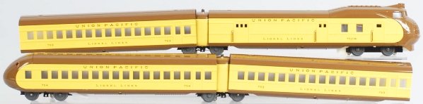 Lionel O-Gauge Union Pacific Passenger Train Set.: Contemporary. Made by MTH. Yellow variation. Includes locomotive and three passenger cars. Includes original box and shipping box. Condition (Near Mint).