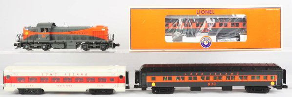 Lot of 4: Long Island Train Items.: Contemporary. Various makers. Includes Atlas diesel engine, K-Line passenger car, Mattituck car, and a pair of matching Lionel Heavyweight passenger cars, both marked "833". Condition (Excellent).