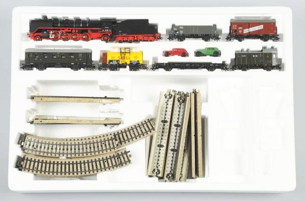 Lot of 2: Marklin HO Freight Train Sets.: Contemporary. Each includes engine, tender, and six cars along with track. Both with original boxes; one marked "Delta 2995" and one marked "Delta 2961". Condition (Excellent).