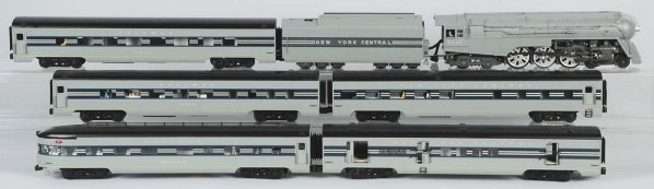MTH New York Central Passenger Train Set.: Contemporary. Includes no. 5445 Hudson-style steam engine with matching tender marked "New York Central" and five passenger cars. Some wear overall. Condition (Excellent).