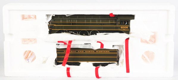 MTH Chicago North Western Steam Engine.: Contemporary. Includes original box. No. 4008 4-6-4-E-4 Hudson Steamer with matching Chicago and North Western tender. Condition (Near Mint).