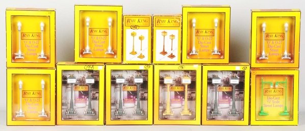 Lot of 12: MTH Rail King Lamp Post Sets.: Contemporary. Includes two no. 57 street lamps and various other sets. All are in original boxes. Condition (Near Mint).