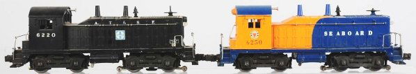 Lot of 2: Lionel O-27 Train Engines.: Circa 1950s. Includes one no. 6250 Seaboard and one no. 6220 Santa Fe. Both with some wear and worn lettering. Condition (Very Good).