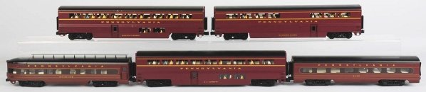 Lot of 5: K-Line Pennsylvania Train Cars.: Contemporary. O-scale. Includes one passenger car marked "Raymond Loewy", one marked "Martin Clement", one marked "Skyline View", one marked "A J Cassatt", and one marked "4420". Some wear overall. Co