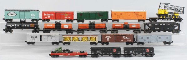 Lot of 17: Contemporary Lionel Freight Cars.: Includes no. 6828 flat car with cherry picker, several Hooker tank cars, and eight various boxcars. Condition (Very Good).