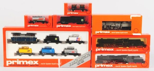 Lot of 7: Primex HO Scale Train Items.: Marked "Made in Western Germany" and "Made in Germany". Includes three engine and tender sets, three freight cars, and one freight car set with five freight cars. All in their original boxes. Conditio