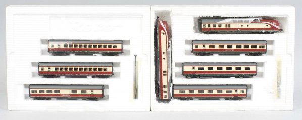 Large 2-Box Austrian HO Passenger Train Set.: Contemporary. Made by Roco. Includes two "Trans Europ Express" power units and three passenger cars in one box. Also includes three extra passenger cars in an additional box. All are in original boxes