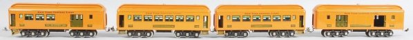 Lot of 4: Lionel 700 Series Passenger Train Cars.: Contemporary. O-gauge. Includes a buffet car, pullman car, dining car, and baggage car. Some paint chipping and wear and some denting to end of baggage car. Condition (Very Good).