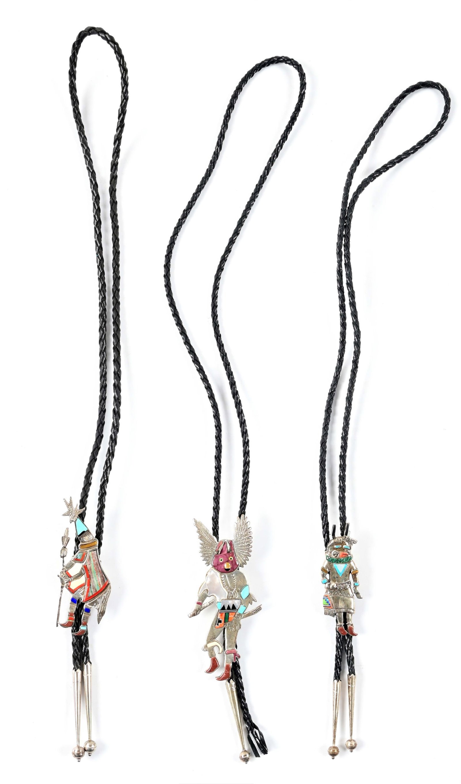 LOT OF 3: STERLING SILVER TURQUOISE MULTI GEM INLAYED NATIVE AMERICAN DANCER BOLO TIE: (A) Zuni Indian silver bolo with coral and lapis inlay. Unknown maker stamp and 'STERLING'. Measurements: 3 1/2" x 1 1/4". Bolo leather is supple and wearable. (B) Zuni Indian silver crow man kachina 