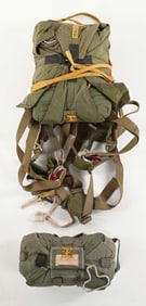 VIETNAM WAR ERA T-10 PARACHUTE, HARNESS, AND RESERVE CHUTE.
