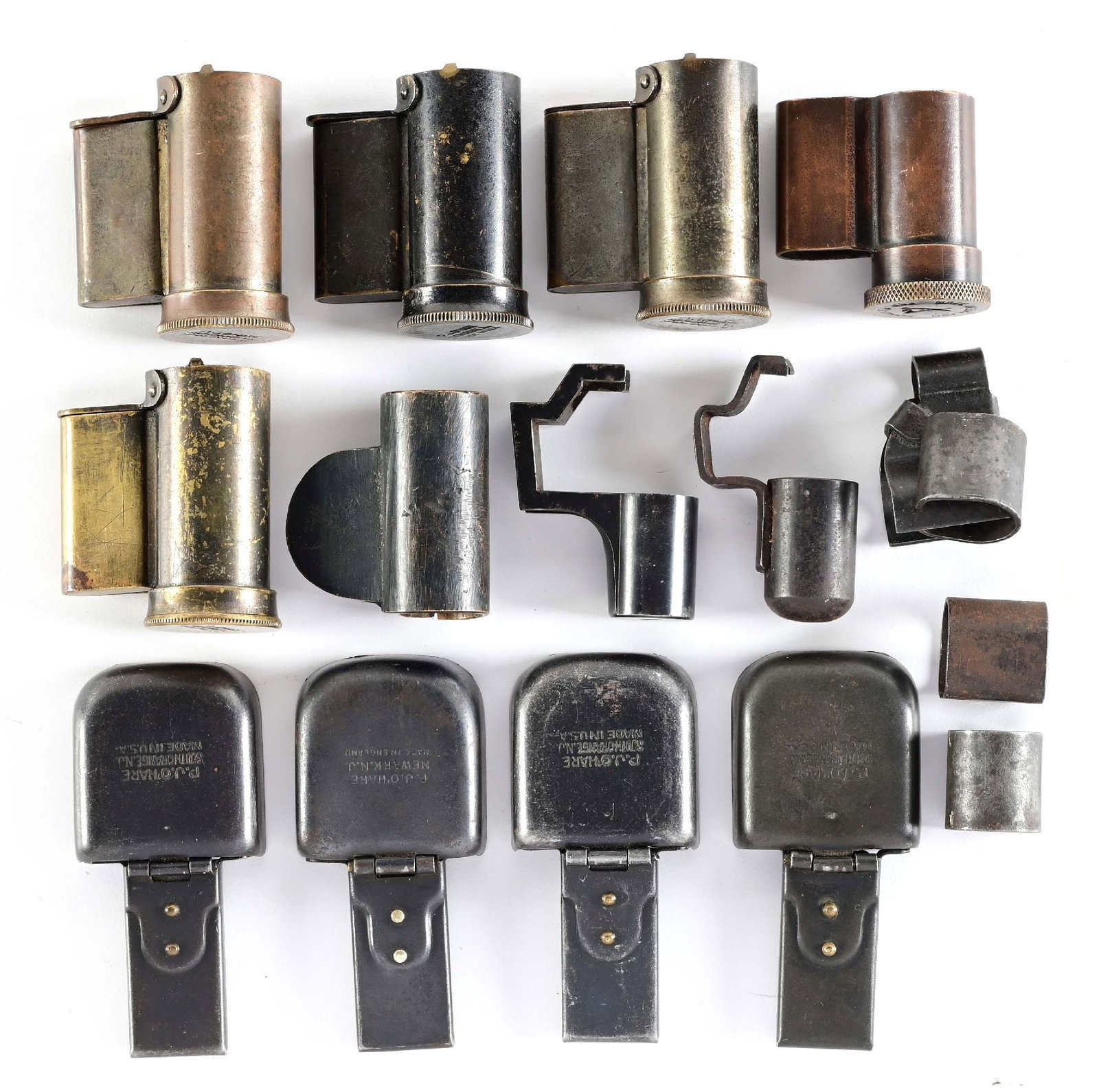 LOT OF 16 MILITARY RIFLE IRON SIGHT COVERS.: Lot consists of (A) Five P.J. O'Hare front sight covers, one of which was made in England, (B) 4 O'Hare rear sight covers, (C) A black painted brass cover with spring side plate, (D) 1903 Springfield 