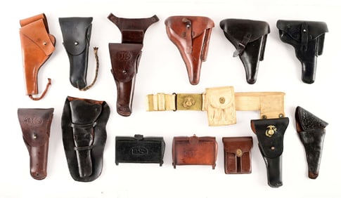LOT OF 12: VINTAGE HOLSTERS AND CARTRIDGE BOXES.