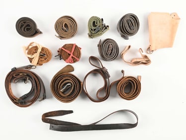 LOT OF SLINGS AND STRAPS.