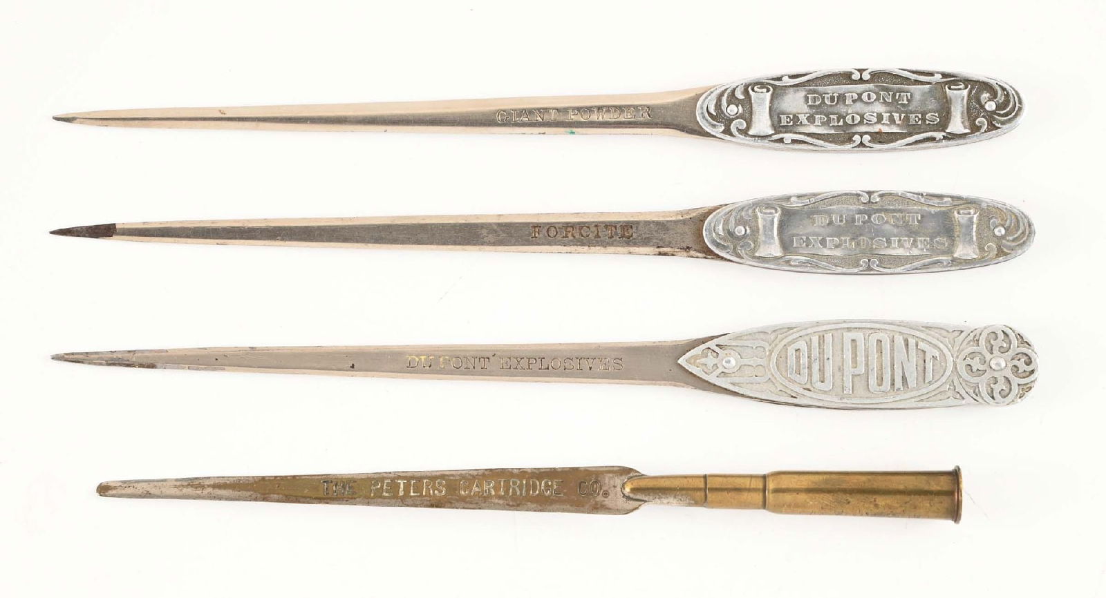 LOT OF 4: GUNPOWDER ADVERTISING LETTER OPENERS.: 3 Du Pont openers with stamped blade variations as follows: "GIANT POWDER", "FORCITE", "DU PONT EXPLOSIVES". .30 US cartridge Peters opener. CONDITION: Very good.