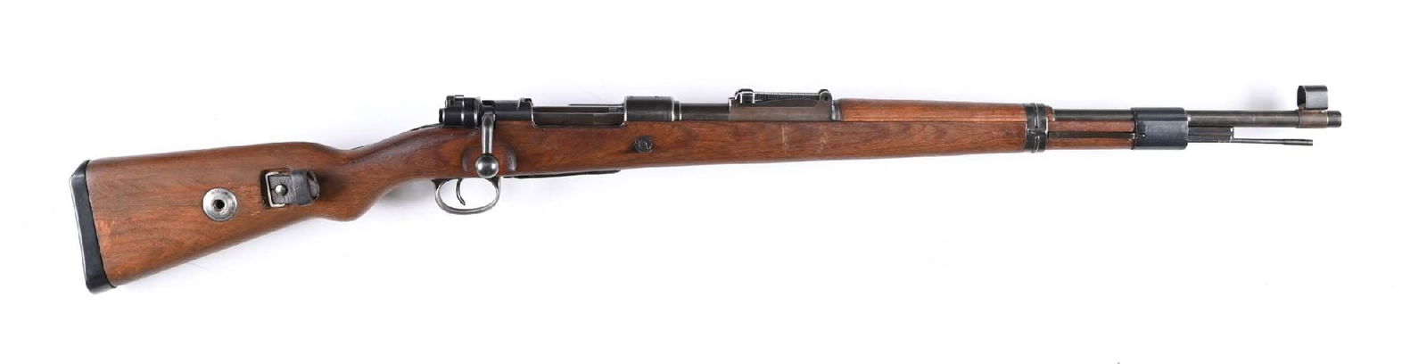 (C) BRUNN DOT CODE K98 BOLT ACTION RIFLE (1944).: Manufactured in 1944. Full military configuration including blued finish, hooded blade front sight, tangent rear, cleaned laminate stock, fabricated mounts, and a cupped butt plate. Front band does no
