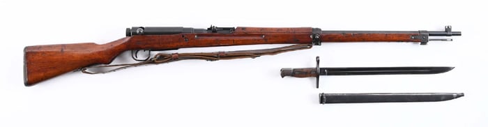 (C) TOYO KOGYO TYPE 99 BOLT ACTION RIFLE WITH BAYONET.