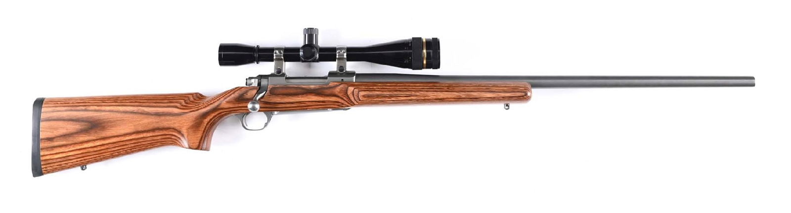 (M) RUGER M77 MARK 2 BRUSHED STAINLESS BOLT ACTION TARGET HEAVY BARREL RIFLE: Features brushed stainless heavy round barrel sans sights, recessed muzzle, bench style laminate stock with pistol grip, straight comb, Ruger black recoil pad and sling eyes. Sports a variable Leupold