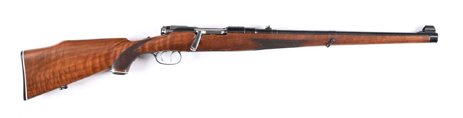 (C) STEYR MANNLICHER SCHOENAUER MODEL MCA BOLT ACTION CARBINE IN .30-06.: Manufactured in 1965. Features the full length checkered walnut stock with pistol grip, while line spacer Steyr buttplate, and black cap. Also features a Monte Carlo comb, rollover cheek piece and swi