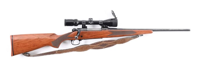 (C) WINCHESTER MODEL 70 BOLT ACTION RIFLE IN .30-06 SPRINGFIELD.
