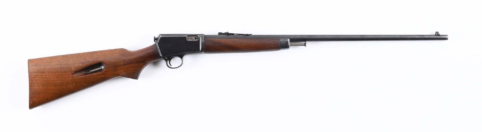 (C) WINCHESTER MODEL 63 SEMI-AUTOMATIC RIFLE.: Manufactured circa 1958, Features include blued Winchester proof steel barrel, sporting sights, takedown receiver, and plain walnut stocks with pistol grip and checkered steel butt plate. CONDITION: V