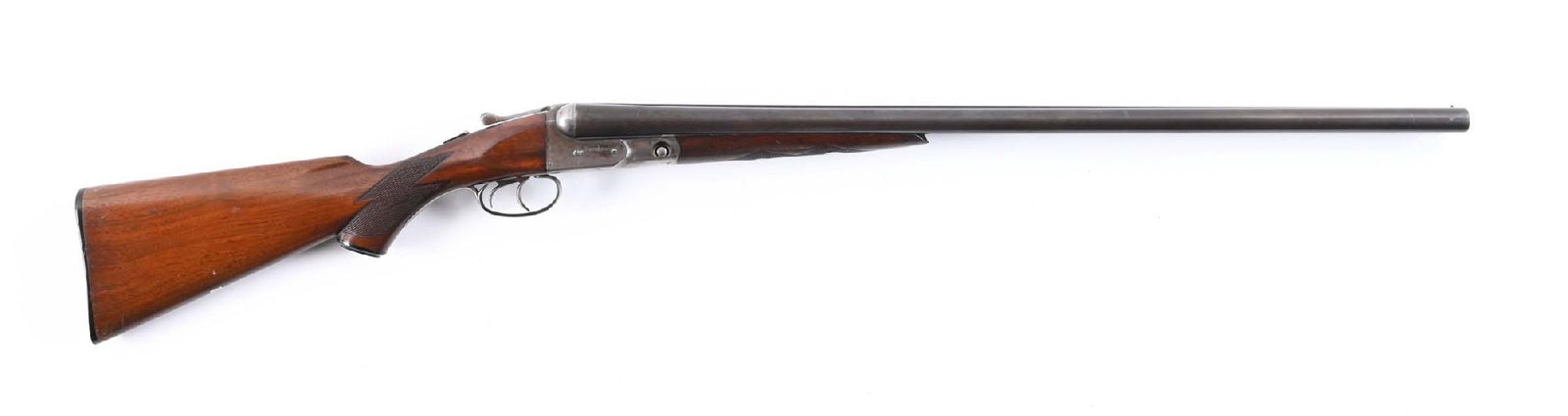 (C) PARKER VH GRADE SIDE BY SIDE 12 GA SHOTGUN.: Built in 1928. All matching numbers. Features a case color box lock, double triggers, blued barrels with single bead front sight and maker legend on matted rib. Extractors. Walnut stock features a che