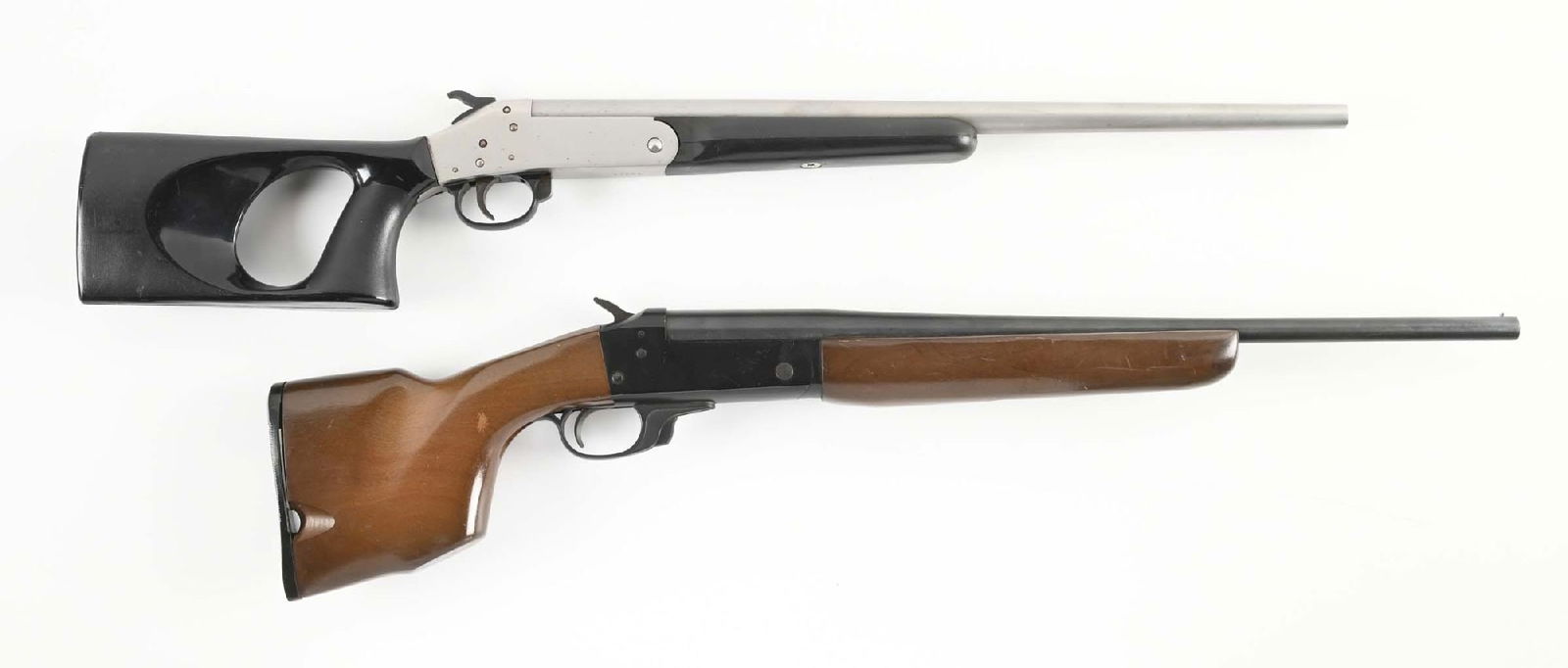 (M) LOT OF 2: SINGLE SHOT .410 SHOTGUNS.: Lot consists of (A) Snake Charmer by Koon of Dallas. Brushed stainless finish, no sights, thumb hole black composite stock. CONDITION: Excellent. Metal shows a few freckles. Stocks have some scuffs. B