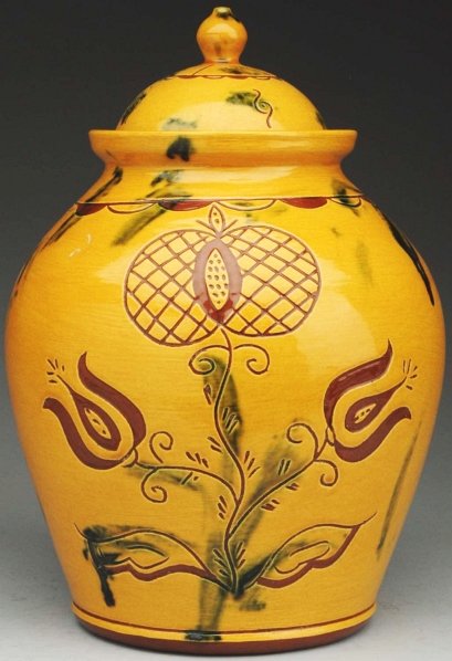 Large Lester Breininger Urn-Shaped Pot with Lid.: 12 - 3/4" T. Redware jar is highly decorated with incised bird and tulips. (Excellent).