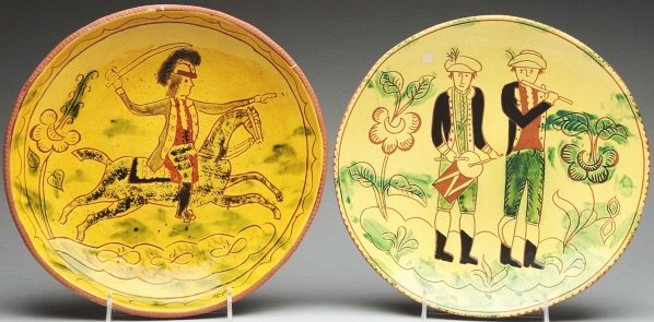 Pair of Lester Breininger Chargers.: Largest: 13" Dia. Includes one decoration with a Hessian soldier on horse and the other with two gentlemen in military dress playing a drum and fife. (Excellent).