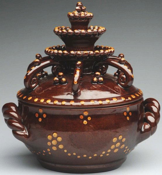 Lester Breininger Redware Sugar Bowl.: 7 - 1/4" T. Highly decorated. Piece shows great workmanship. (Excellent).