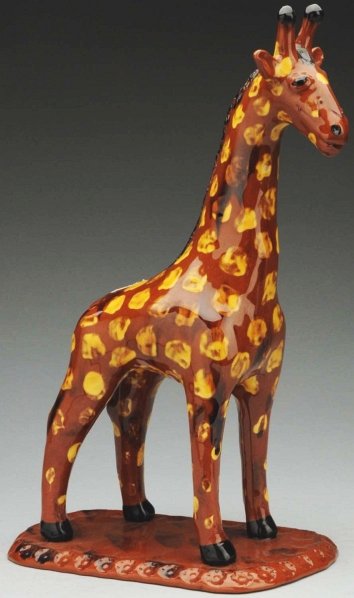 Very Unusual Lester Breininger Redware Giraffe.: 13" T. Attached to an incised base. (Excellent).