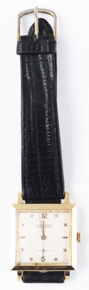 Ulysse Nardin Wrist Watch.: Circa 1950s. 14k gold case on leather band. Mechanical. Chronometer. Condition: 8. CORRECTION: This watch is 14k gold, not gold filled.