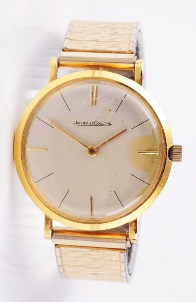 18k Yellow Gold Jaeger-LeCoultre Wristwatch.: Manual wind movement, with some corrosion present. Working condition. Minor stains on dial and scratches on crystal. Includes 18k yellow gold case.