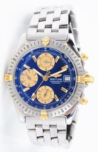 Breitling Wrist Watch with Box.: Circa 2006. Chronograph Swiss. S/S bracket. With original box. 60 second-30 minute-12 hour. Condition: 8.