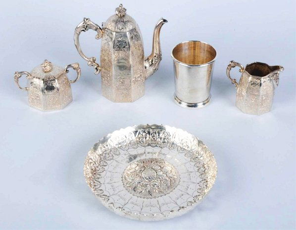 Lot of 4: Silver Pieces With Extra Sterling Cup.: Weight is 36 troy ounces. Set includes a tea pot, a sugar and a creamer. Heavily etched with intricate scene. Lot also includes a mint julep cup. Condition (Excellent). Size Largest: 8" Dia.