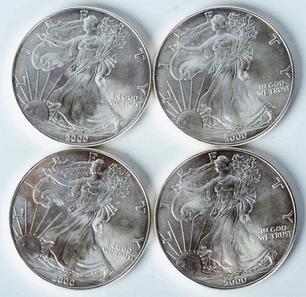Lot of 9: Pieces.: Includes four 1-ounce American Eagle coins and five one-ounce .999 silver ingots. Eagle coins are year 2000. Condition (Excellent).