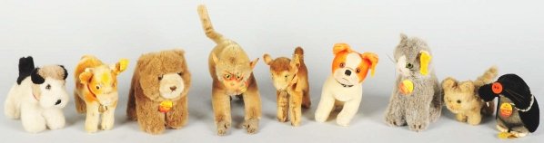 Lot of 8: Steiff Animals.: Includes Susi with chest tag and button, Moxi with chest tag and button, Browny with chest tag and button, dog with button only, Coco monkey with chest tag only, dog with button only, fawn with button