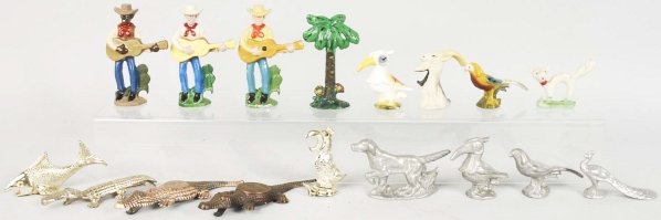 Lot of 17: Assorted Figural Bottle Openers.: Aluminum and pot metal. Condition (Good). Size Largest: 4 - 3/8" T.