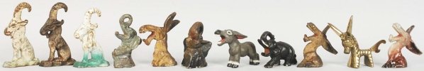 Lot of 11: Assorted Figural Bottle Openers.: Cast iron and brass. Condition (Good). Size Largest: 4 - 3/8" T.
